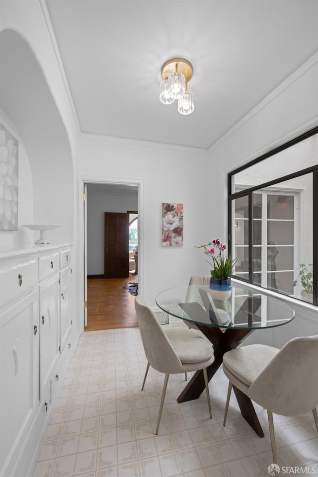 57 Masonic Ave, San Francisco, CA 94118 - dining space with light flooring, crown molding, and a chandelier