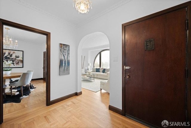57 Masonic Ave, San Francisco, CA 94118 - hallway featuring a chandelier, arched walkways, and crown molding