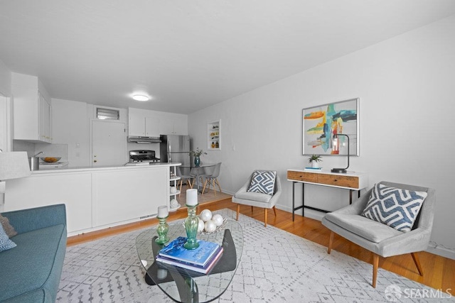 57 Masonic Ave, San Francisco, CA 94118 - living room with light wood-style floors and baseboards