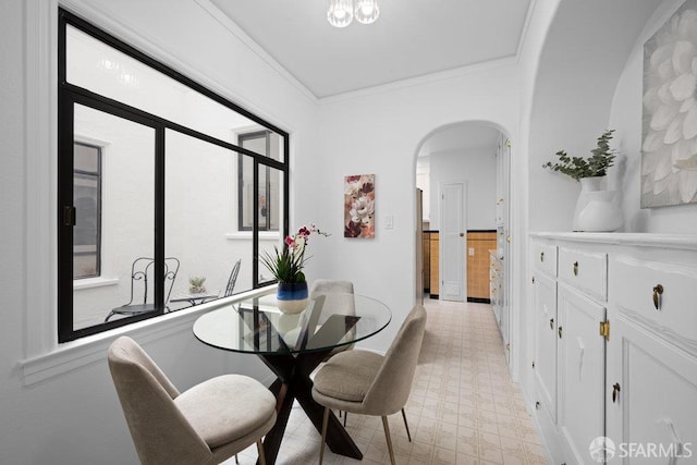 57 Masonic Ave, San Francisco, CA 94118 - dining room featuring arched walkways, light flooring, and crown molding