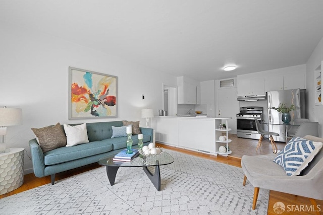 57 Masonic Ave, San Francisco, CA 94118 - living area with light wood-type flooring