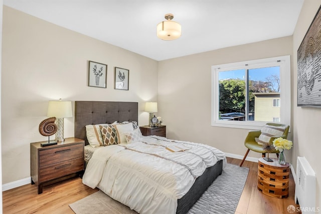 bedroom featuring light hardwood / wood-style floors