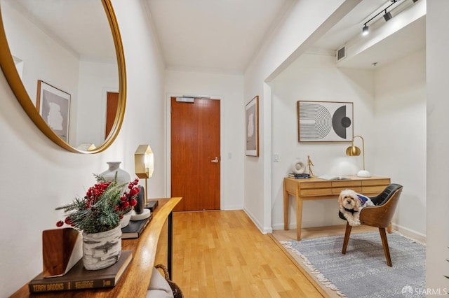 hallway featuring hardwood / wood-style floors