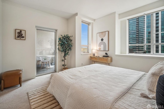 bedroom featuring access to outside, carpet, and ornamental molding