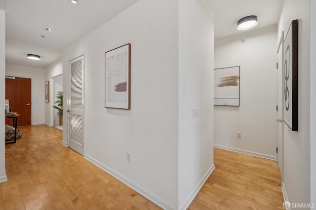 corridor featuring light wood-type flooring