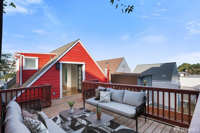 deck with an outdoor hangout area