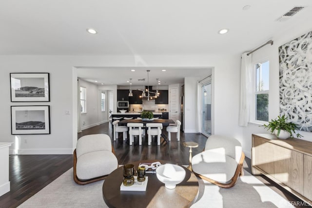 2768 Bette St, Alameda, CA 94501 - living room featuring recessed lighting, dark wood-type flooring, and healthy amount of natural light
