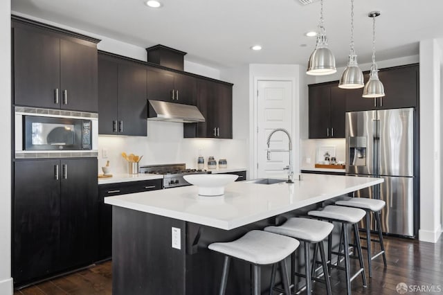 2768 Bette St, Alameda, CA 94501 - kitchen featuring stainless steel fridge, black microwave, under cabinet range hood, stove, and dark wood-style flooring