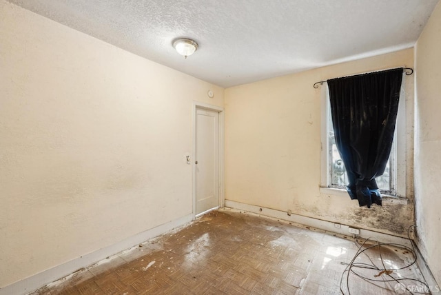2714 Diamond St, San Francisco, CA 94131 - spare room featuring a textured ceiling and baseboards