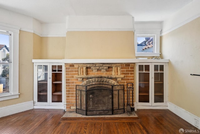 2714 Diamond St, San Francisco, CA 94131 - detailed view of wood finished floors, a brick fireplace, and baseboards