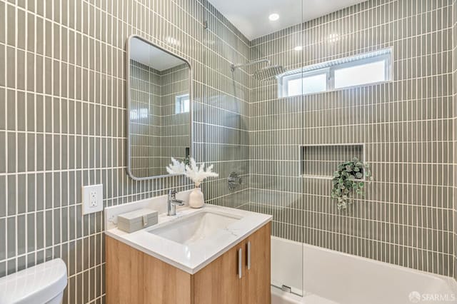 115 Gladeview Way, San Francisco, CA 94131 - bathroom with tile walls, vanity, toilet, and shower / washtub combination