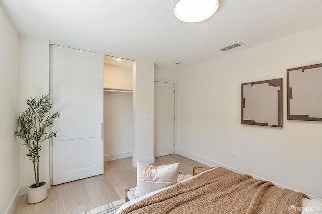115 Gladeview Way, San Francisco, CA 94131 - bedroom featuring baseboards, wood finished floors, and a closet