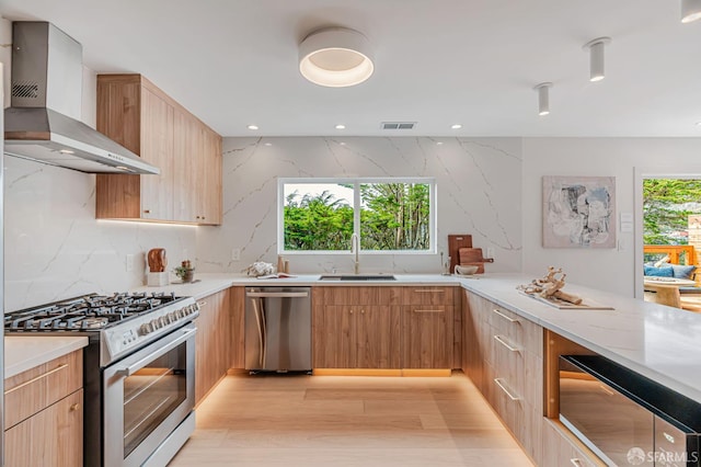 115 Gladeview Way, San Francisco, CA 94131 - kitchen featuring stainless steel appliances, wall chimney exhaust hood, a sink, modern cabinets, and recessed lighting