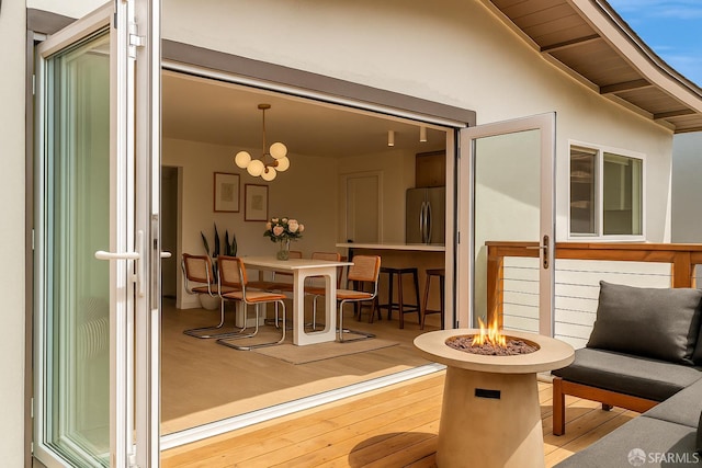 115 Gladeview Way, San Francisco, CA 94131 - view of wooden balcony with a fire pit and a wooden deck