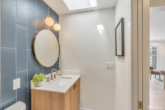 115 Gladeview Way, San Francisco, CA 94131 - bathroom featuring a skylight, vanity, and toilet