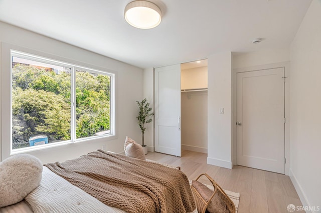 115 Gladeview Way, San Francisco, CA 94131 - bedroom featuring light wood-type flooring, baseboards, and a closet