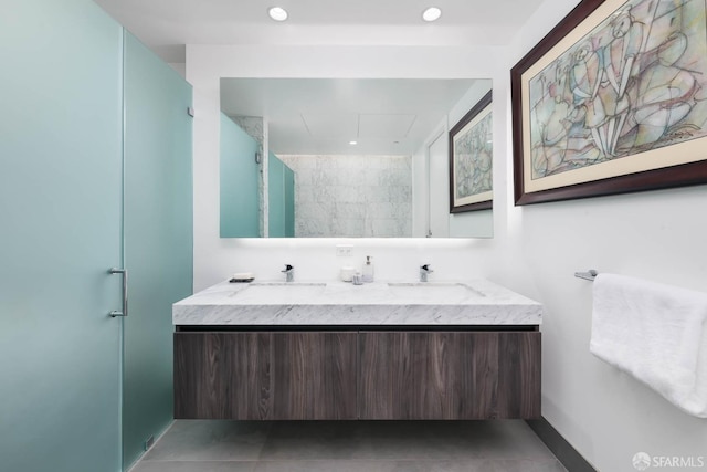 full bath with double vanity and a sink
