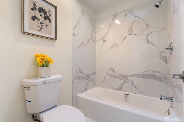 bathroom featuring toilet and shower / bathtub combination