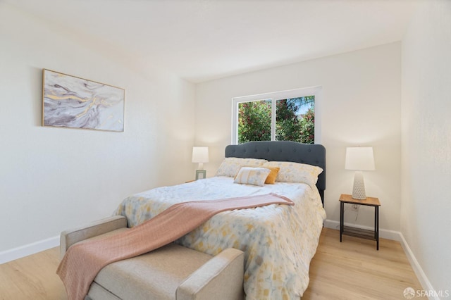 bedroom with light hardwood / wood-style floors