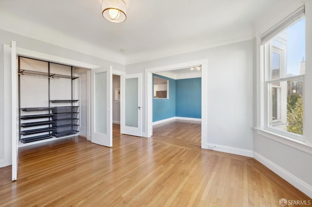 1930 Grove St Unit 4, San Francisco, CA 94117 - unfurnished bedroom featuring light wood-type flooring and a closet