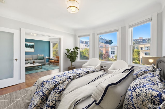 1930 Grove St Unit 4, San Francisco, CA 94117 - bedroom featuring multiple windows and wood finished floors
