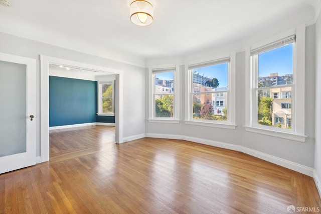 1930 Grove St Unit 4, San Francisco, CA 94117 - unfurnished room featuring plenty of natural light and wood finished floors