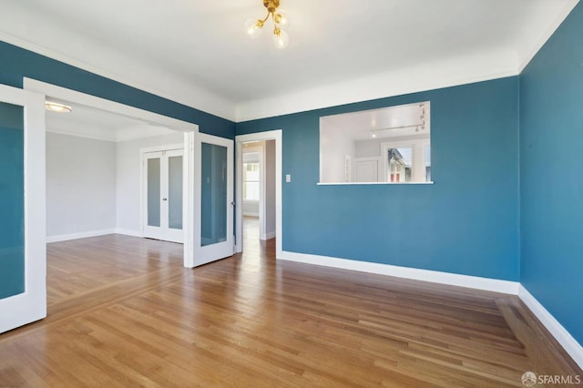 1930 Grove St Unit 4, San Francisco, CA 94117 - spare room with french doors, wood finished floors, and crown molding