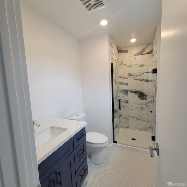 939-9411/2 26th St, Oakland, CA 94601 - bathroom featuring vanity, visible vents, recessed lighting, toilet, and a marble finish shower