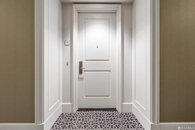 entryway featuring light tile patterned floors