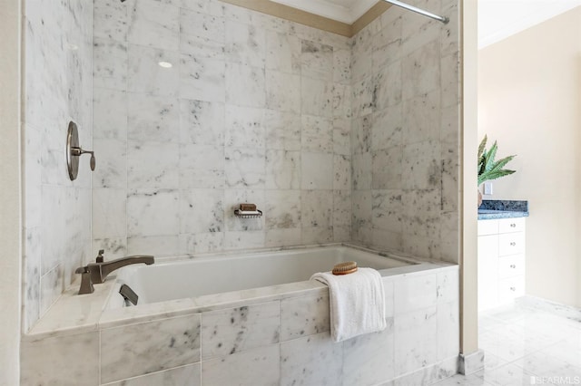 bathroom with ornamental molding and tiled shower / bath combo