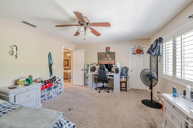 2035 Kirkwood Ct, Fairfield, CA 94534 - carpeted bedroom featuring an office area, a textured ceiling, and a ceiling fan