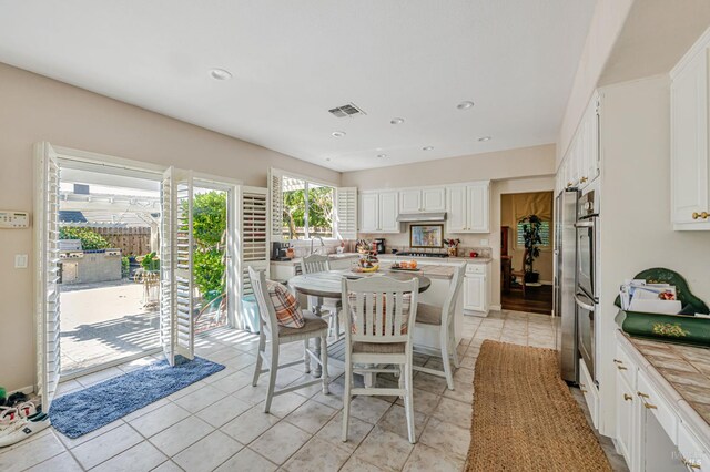 2035 Kirkwood Ct, Fairfield, CA 94534 - dining space featuring light tile patterned flooring and recessed lighting