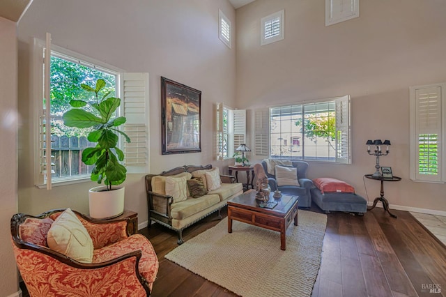 2035 Kirkwood Ct, Fairfield, CA 94534 - living area featuring plenty of natural light, hardwood / wood-style flooring, a high ceiling, and baseboards