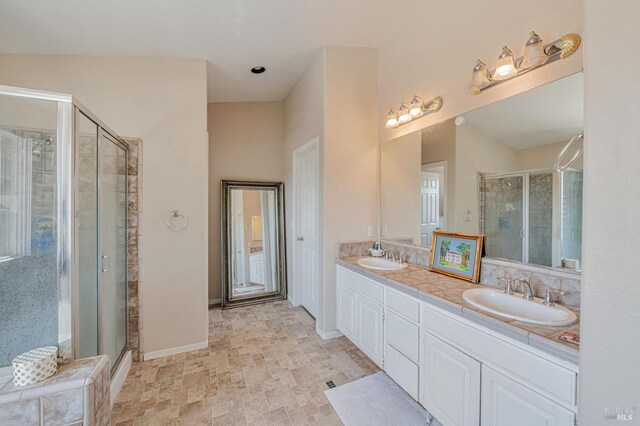 2035 Kirkwood Ct, Fairfield, CA 94534 - full bath featuring a shower stall, double vanity, and baseboards