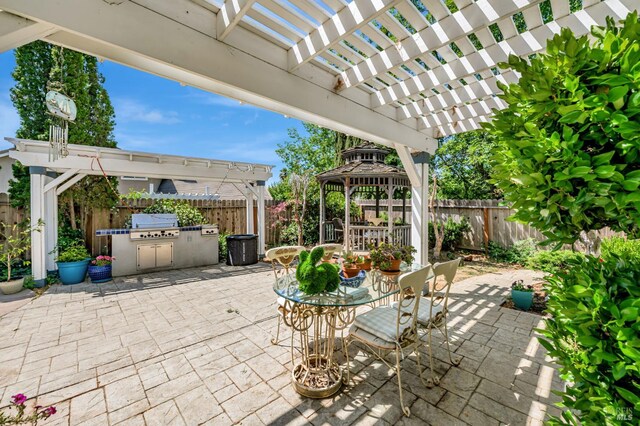 2035 Kirkwood Ct, Fairfield, CA 94534 - fenced backyard featuring a gazebo, a pergola, a patio, and outdoor dining space