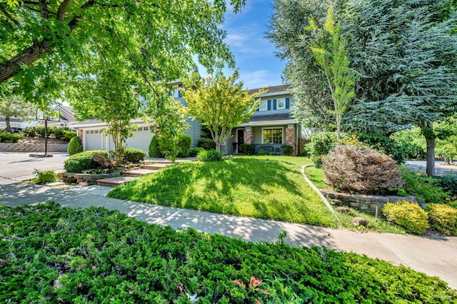 2035 Kirkwood Ct, Fairfield, CA 94534 - obstructed view of property with a front lawn, brick siding, and driveway