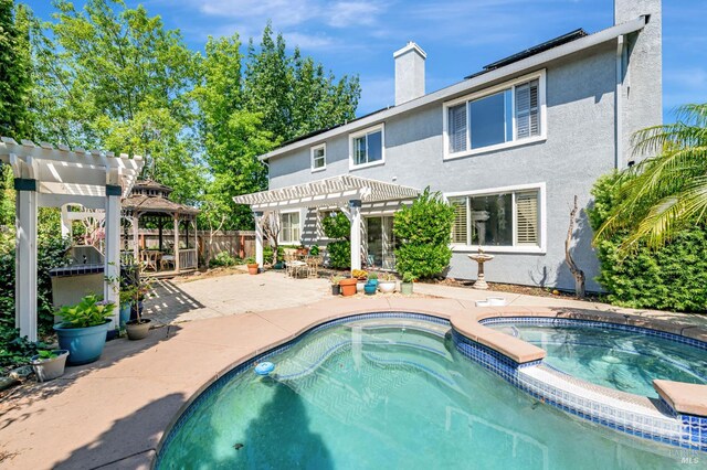 2035 Kirkwood Ct, Fairfield, CA 94534 - view of swimming pool with a pergola, a patio area, and a pool with connected hot tub
