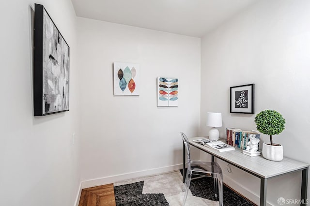 office area featuring baseboards