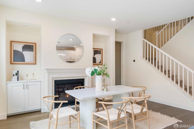 dining space featuring light hardwood / wood-style flooring