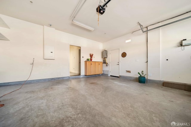 garage featuring electric panel and a garage door opener