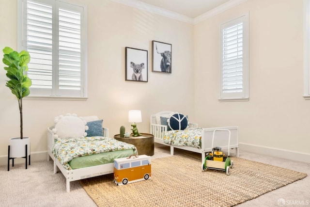 carpeted bedroom featuring crown molding