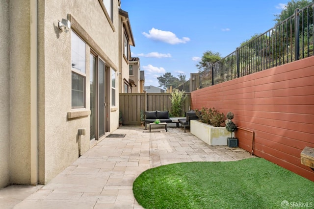 view of patio with an outdoor living space