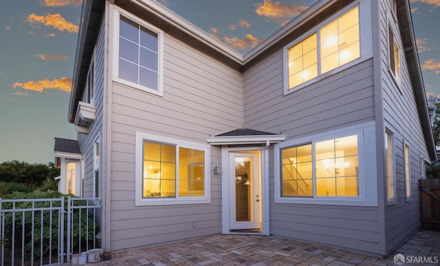 3044 Whisperwave Cir, Redwood City, CA 94065 - back of house at dusk featuring a patio