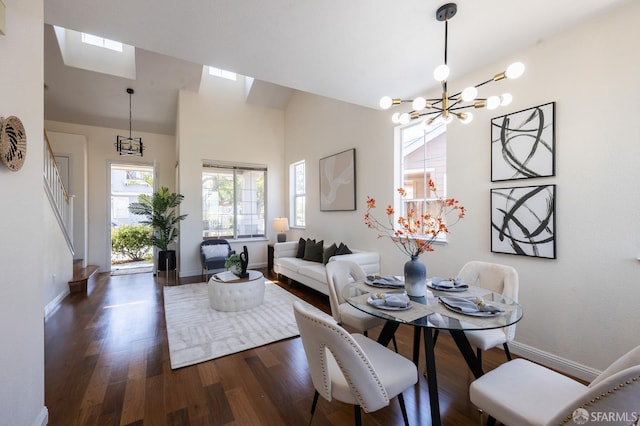 3044 Whisperwave Cir, Redwood City, CA 94065 - dining space featuring a chandelier, baseboards, dark wood-style floors, stairway, and lofted ceiling