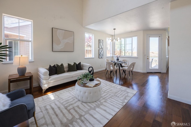 3044 Whisperwave Cir, Redwood City, CA 94065 - living room with a chandelier, baseboards, and wood finished floors