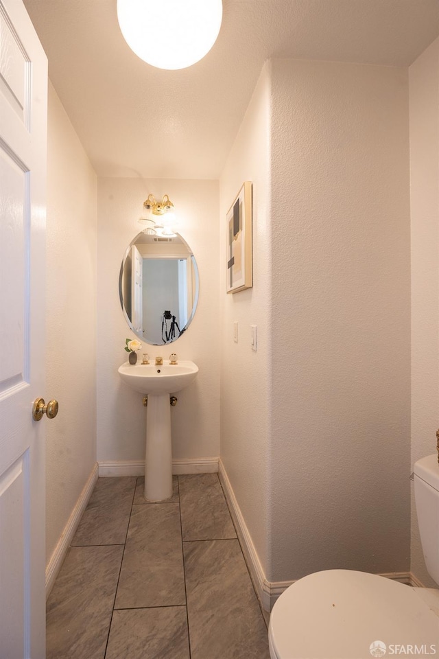 3044 Whisperwave Cir, Redwood City, CA 94065 - bathroom with toilet, tile patterned floors, and baseboards