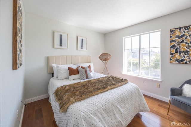 3044 Whisperwave Cir, Redwood City, CA 94065 - bedroom with baseboards and wood finished floors
