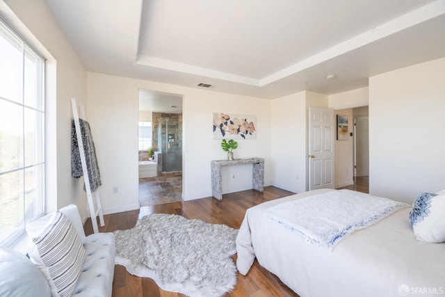 3044 Whisperwave Cir, Redwood City, CA 94065 - bedroom with a tray ceiling, wood finished floors, ensuite bath, and baseboards