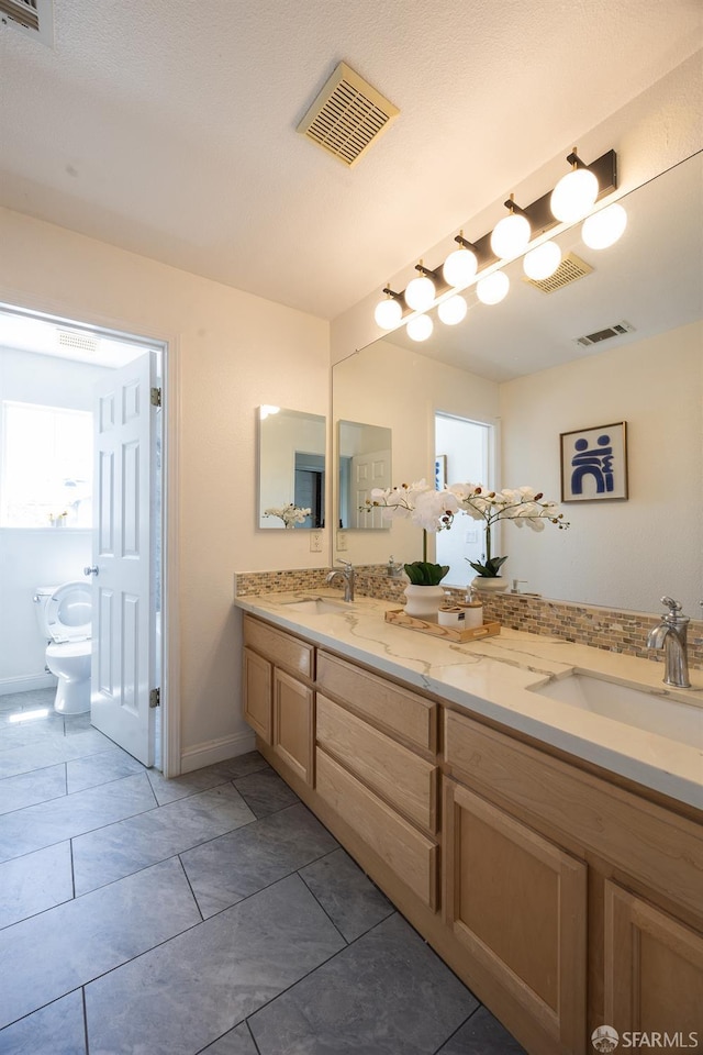 3044 Whisperwave Cir, Redwood City, CA 94065 - full bathroom with double vanity, tile patterned flooring, and toilet