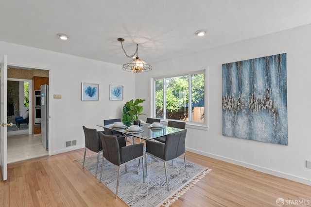 532 Vista Ct, Millbrae, CA 94030 - dining area featuring plenty of natural light, light wood finished floors, and a chandelier